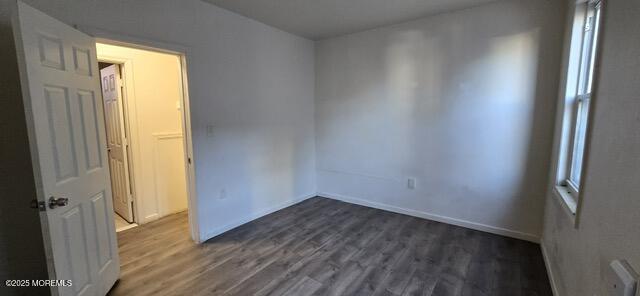 523 State Street Perth Amboy, NJ 08861 - Photo 8 of 12 a view of a small space with wooden floor and a window