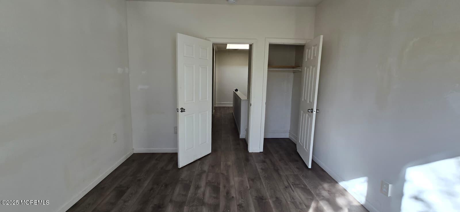 523 State Street Perth Amboy, NJ 08861 - Photo 9 of 12 a view of a hallway with wooden floor