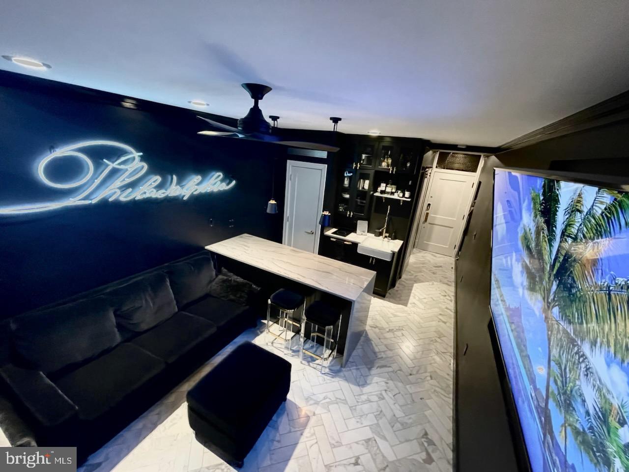 1324 Locust Street, Unit 429 Philadelphia, PA 19107 - Photo 1 of 23 a view of a couches and dinning table in a room