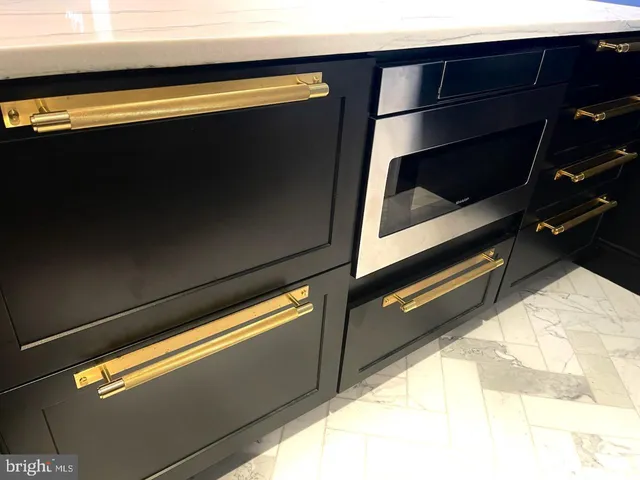 a bedroom with a bed and a lamp