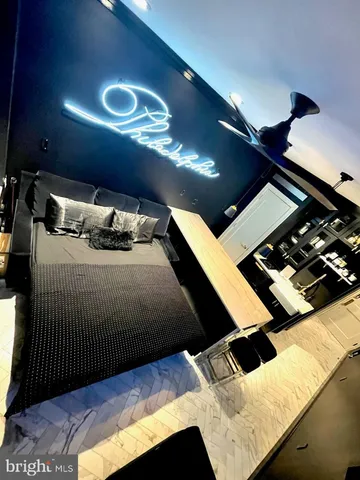 a bathroom with a sink toilet shower and a mirror