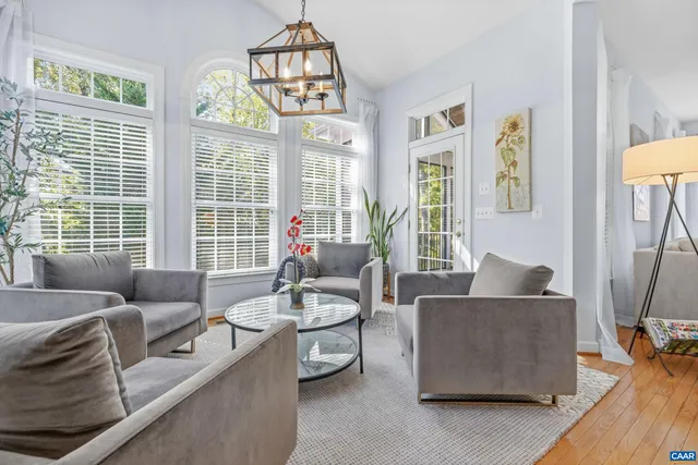 a kitchen with stainless steel appliances granite countertop a refrigerator a sink and a stove