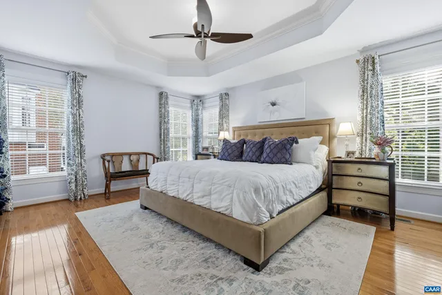 a white bath tub sitting next to a window