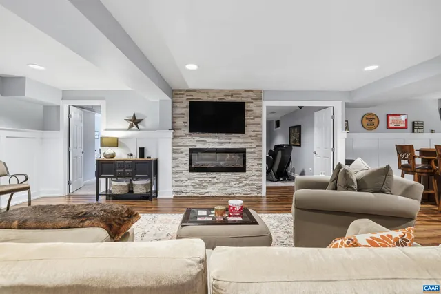 a kitchen with stainless steel appliances granite countertop a stove and a refrigerator