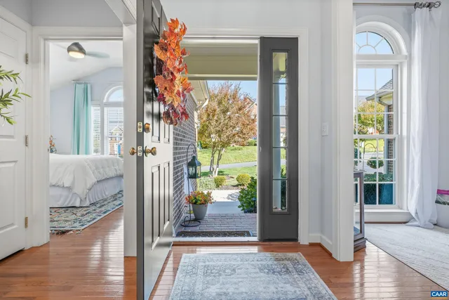 a view of a hallway view with staircase