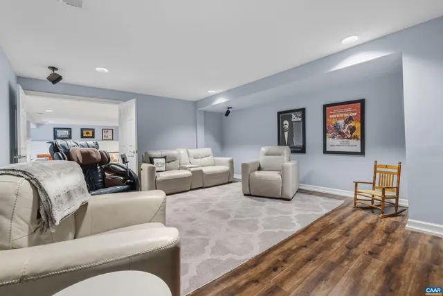 a view of a patio with table and chairs and potted plants
