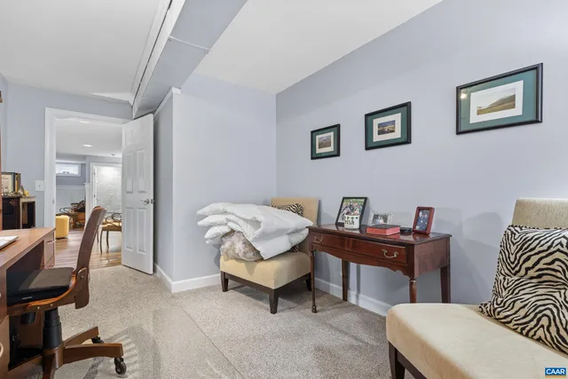 a view of a patio with table and chairs and potted plants