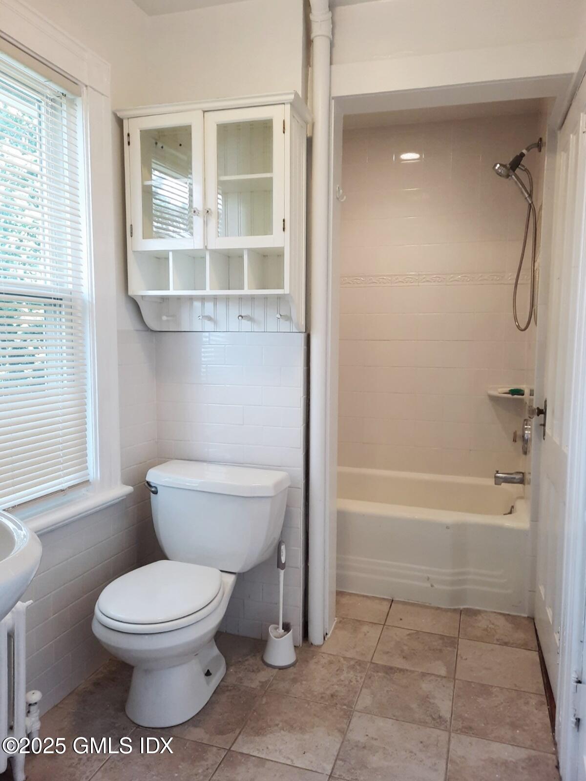 55 Valley Road Cos Cob, CT 06807 - Photo 18 of 21 a bathroom with a toilet and a shower