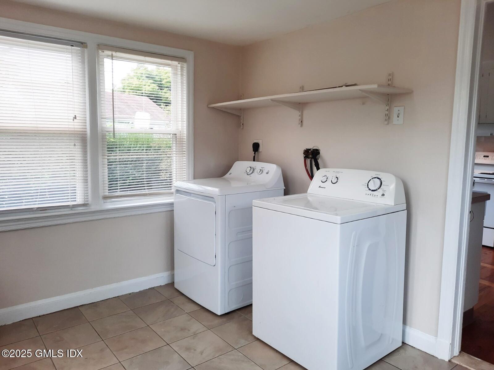 55 Valley Road Cos Cob, CT 06807 - Photo 7 of 21 a utility room with dryer and washer