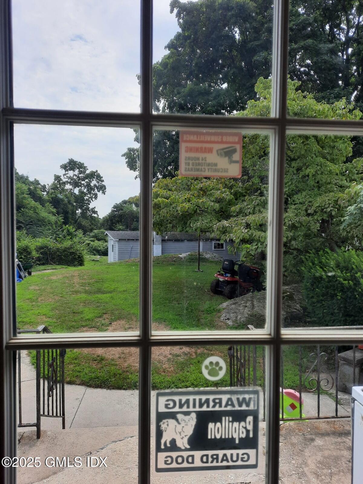 55 Valley Road Cos Cob, CT 06807 - Photo 9 of 21 a view of a back yard from a room