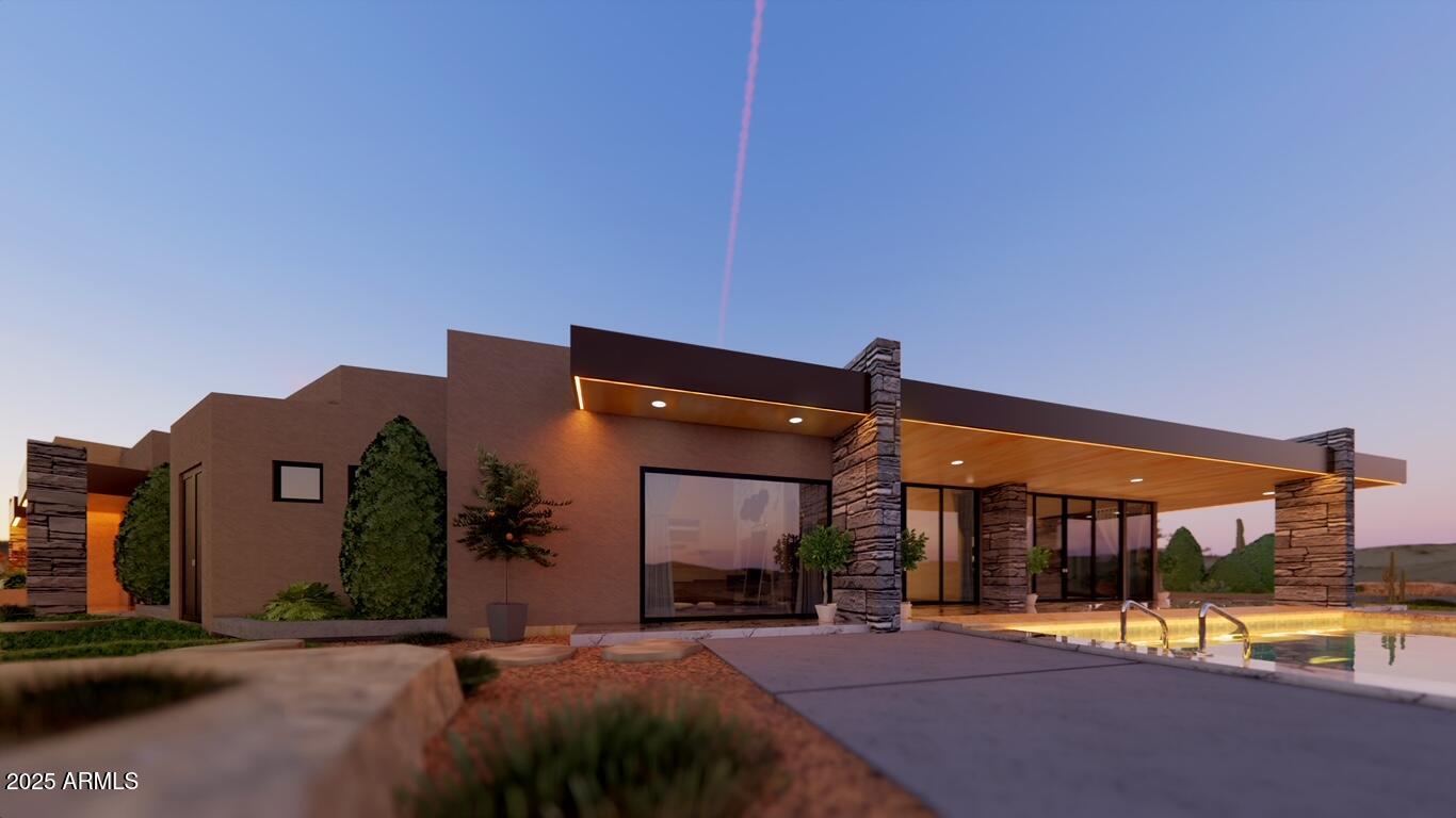 10876 East Rising Sun Drive Scottsdale, AZ 85262 - Photo 1 of 33 a view of a building with a patio