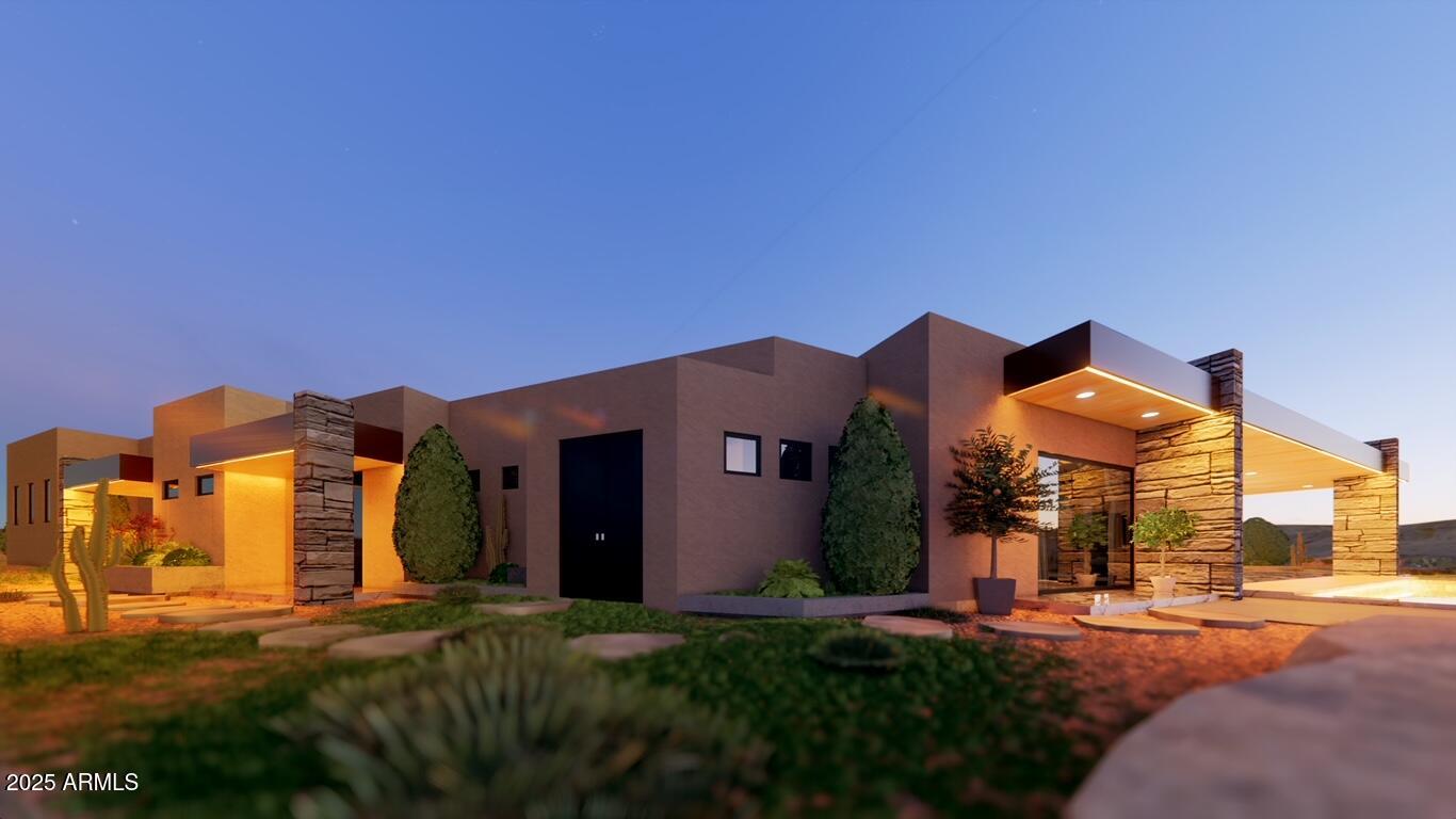 10876 East Rising Sun Drive Scottsdale, AZ 85262 - Photo 10 of 33 a backyard of a house with table and chairs