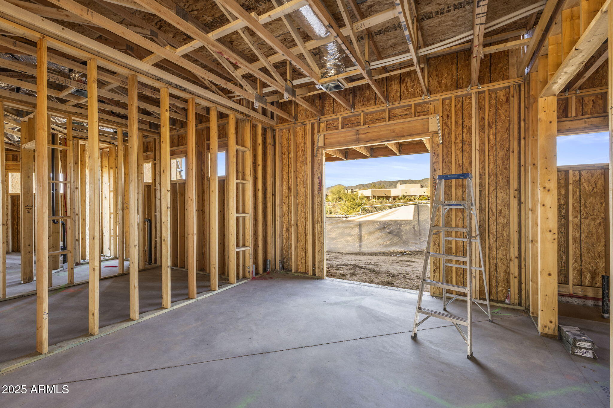 10876 East Rising Sun Drive Scottsdale, AZ 85262 - Photo 18 of 33 a view of an empty room with a sliding door
