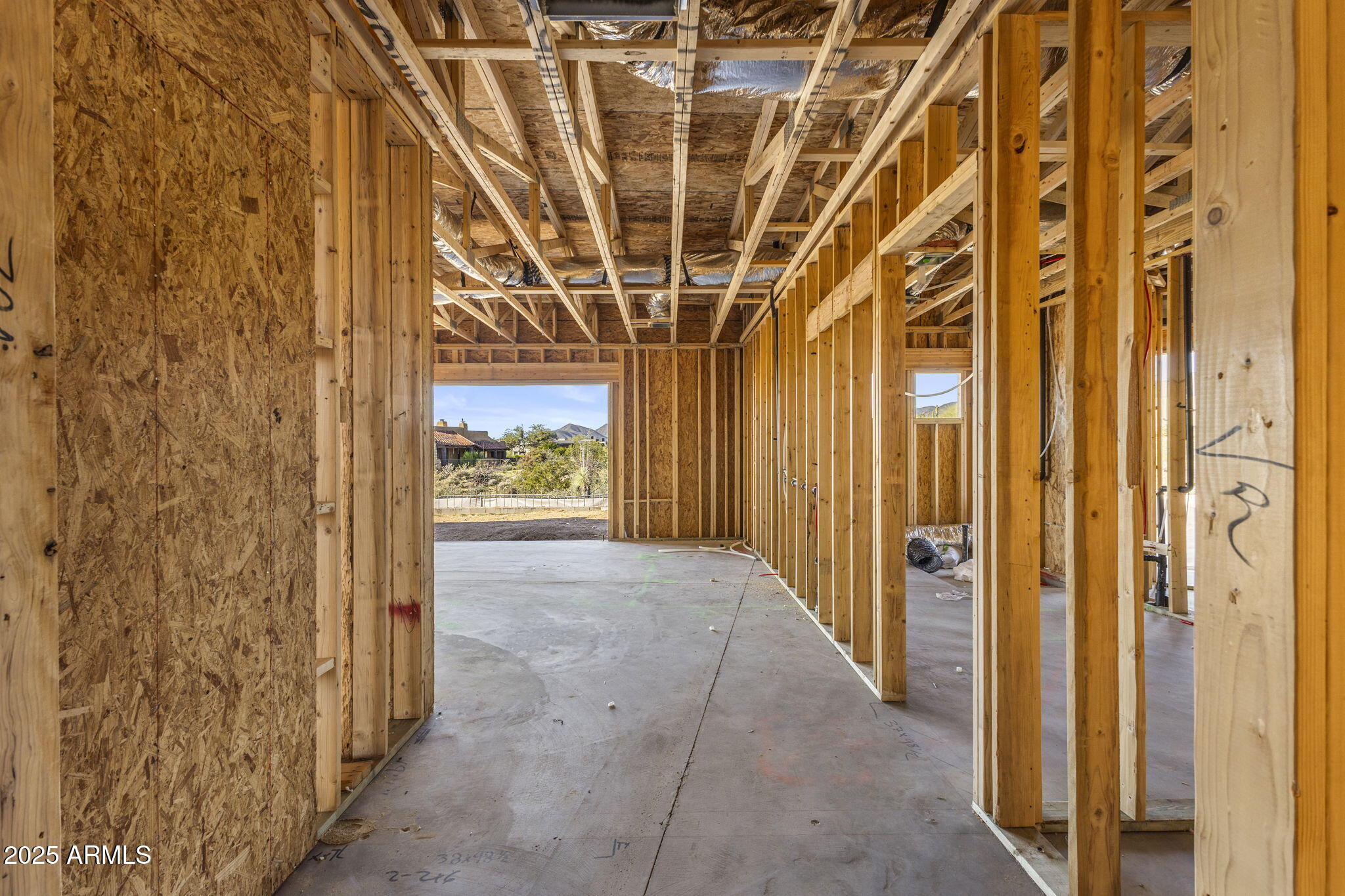 10876 East Rising Sun Drive Scottsdale, AZ 85262 - Photo 20 of 33 a view of a hallway with wooden walls