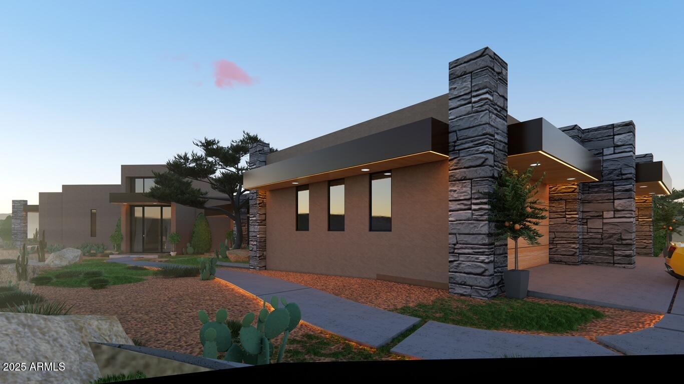 10876 East Rising Sun Drive Scottsdale, AZ 85262 - Photo 2 of 33 a front view of a house with a yard