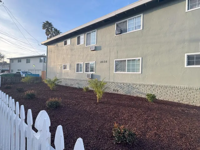 a house view with a backyard space