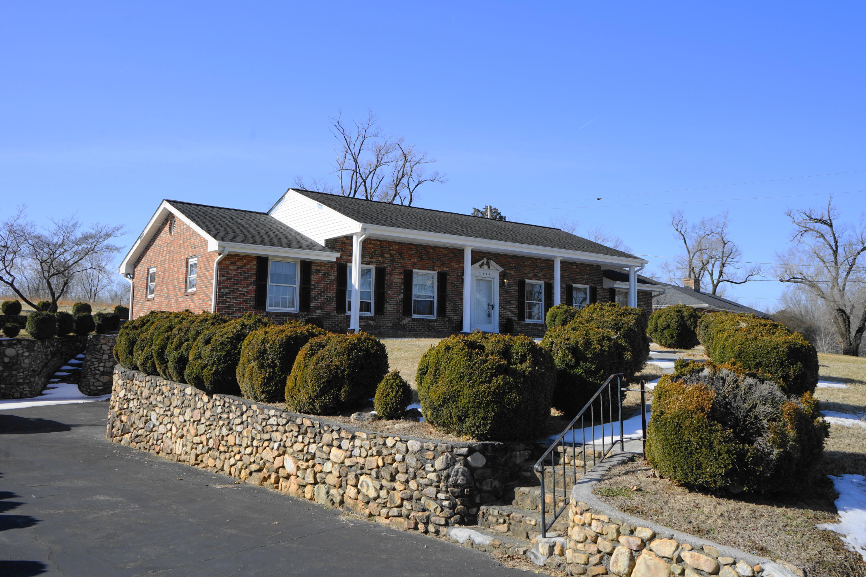 2231 Hardy Road Vinton, VA 24179 - Photo 1 of 38 a front view of a house with a garden