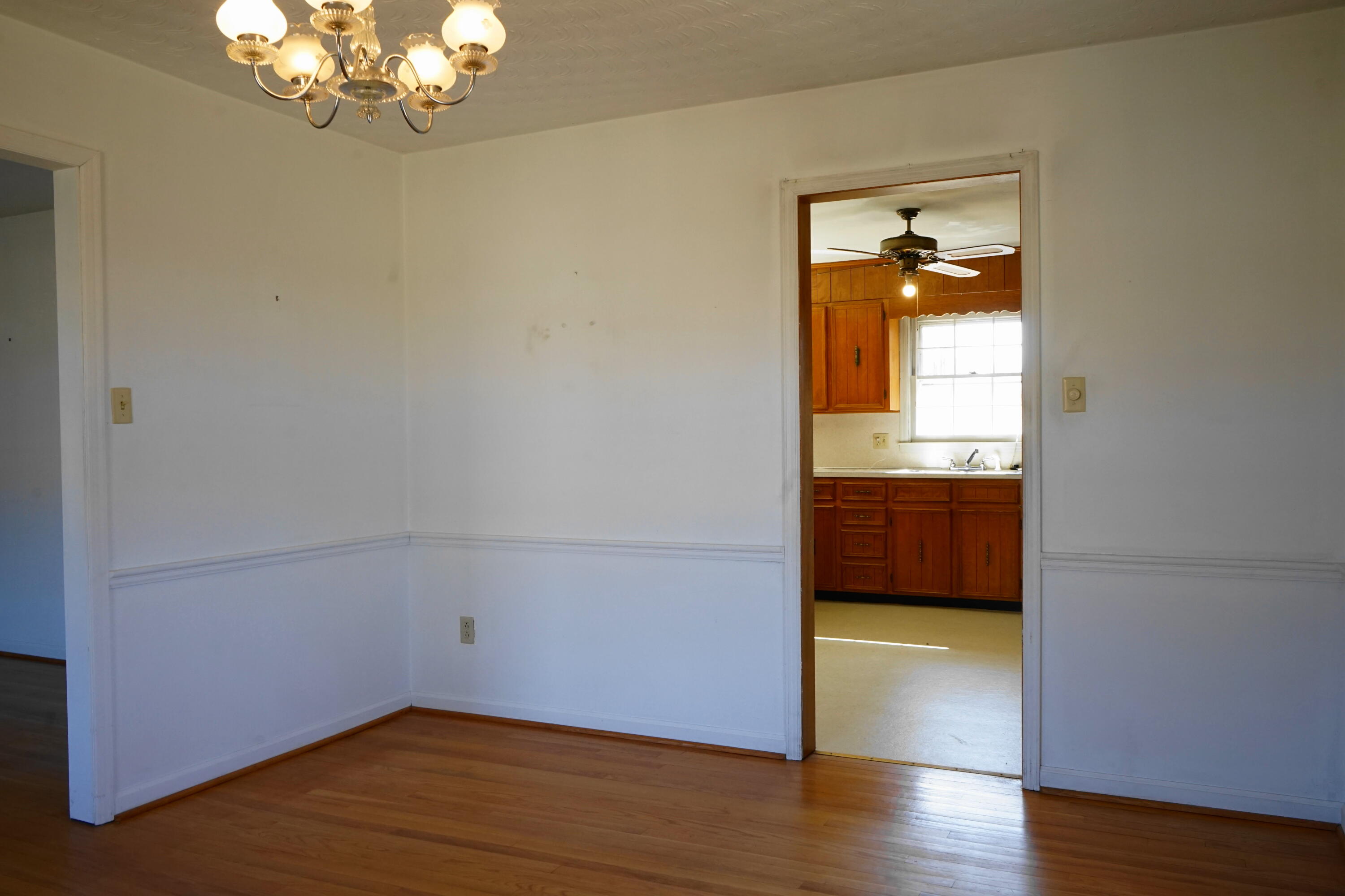 2231 Hardy Road Vinton, VA 24179 - Photo 14 of 38 a view of an empty room and wooden floor