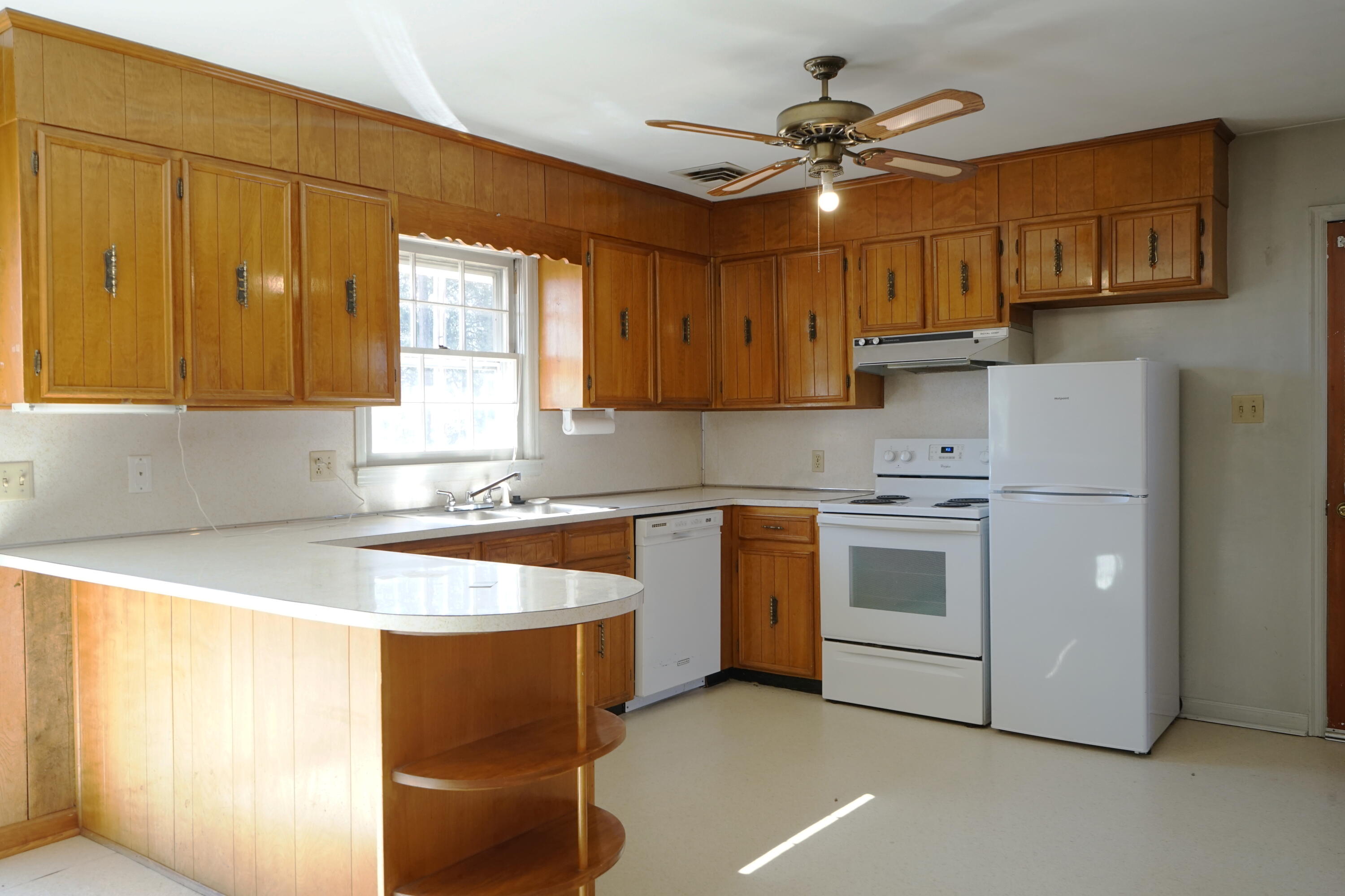 2231 Hardy Road Vinton, VA 24179 - Photo 16 of 38 a kitchen with stainless steel appliances granite countertop a sink a stove and a refrigerator