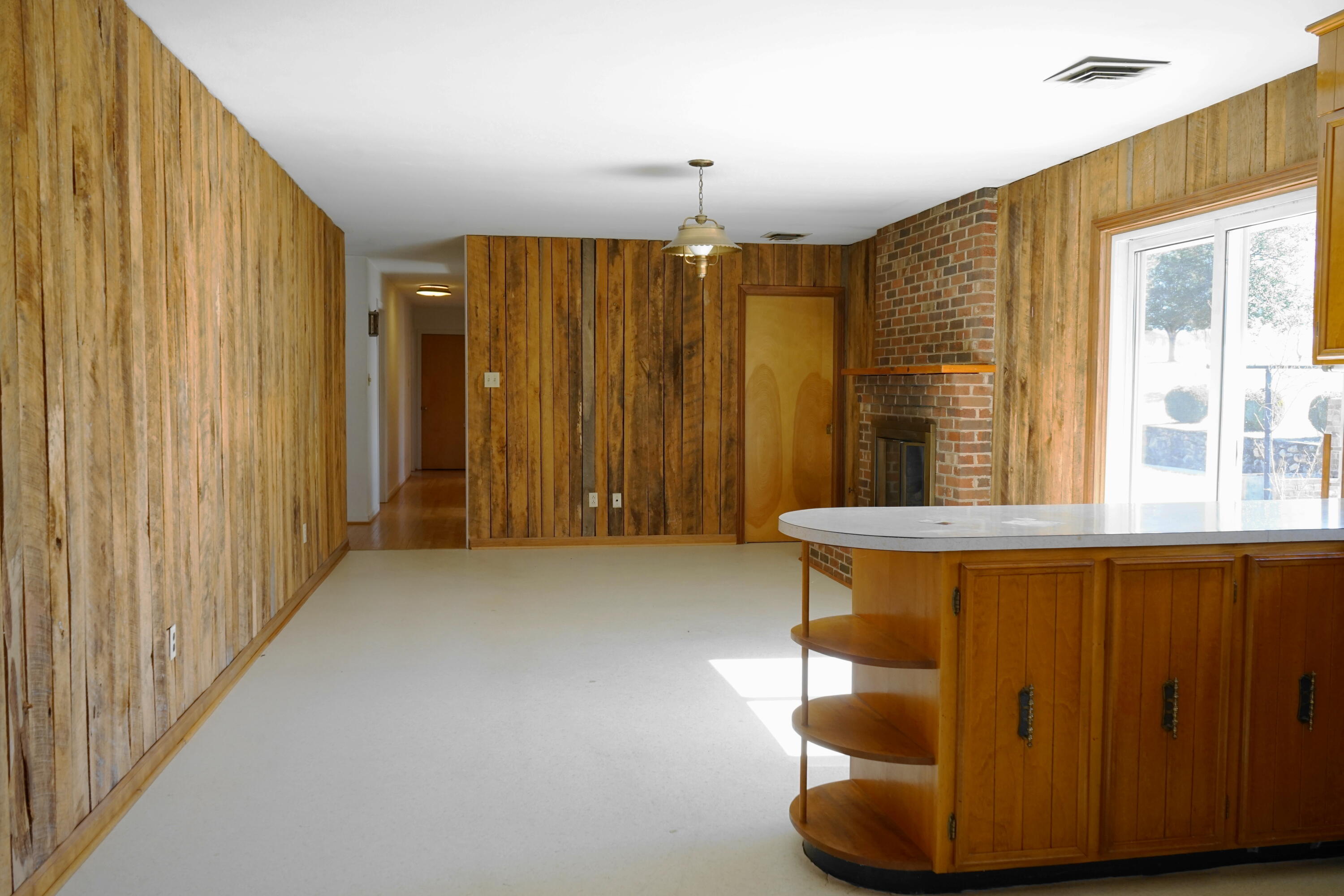 2231 Hardy Road Vinton, VA 24179 - Photo 17 of 38 a view of a room with wooden floor and windows