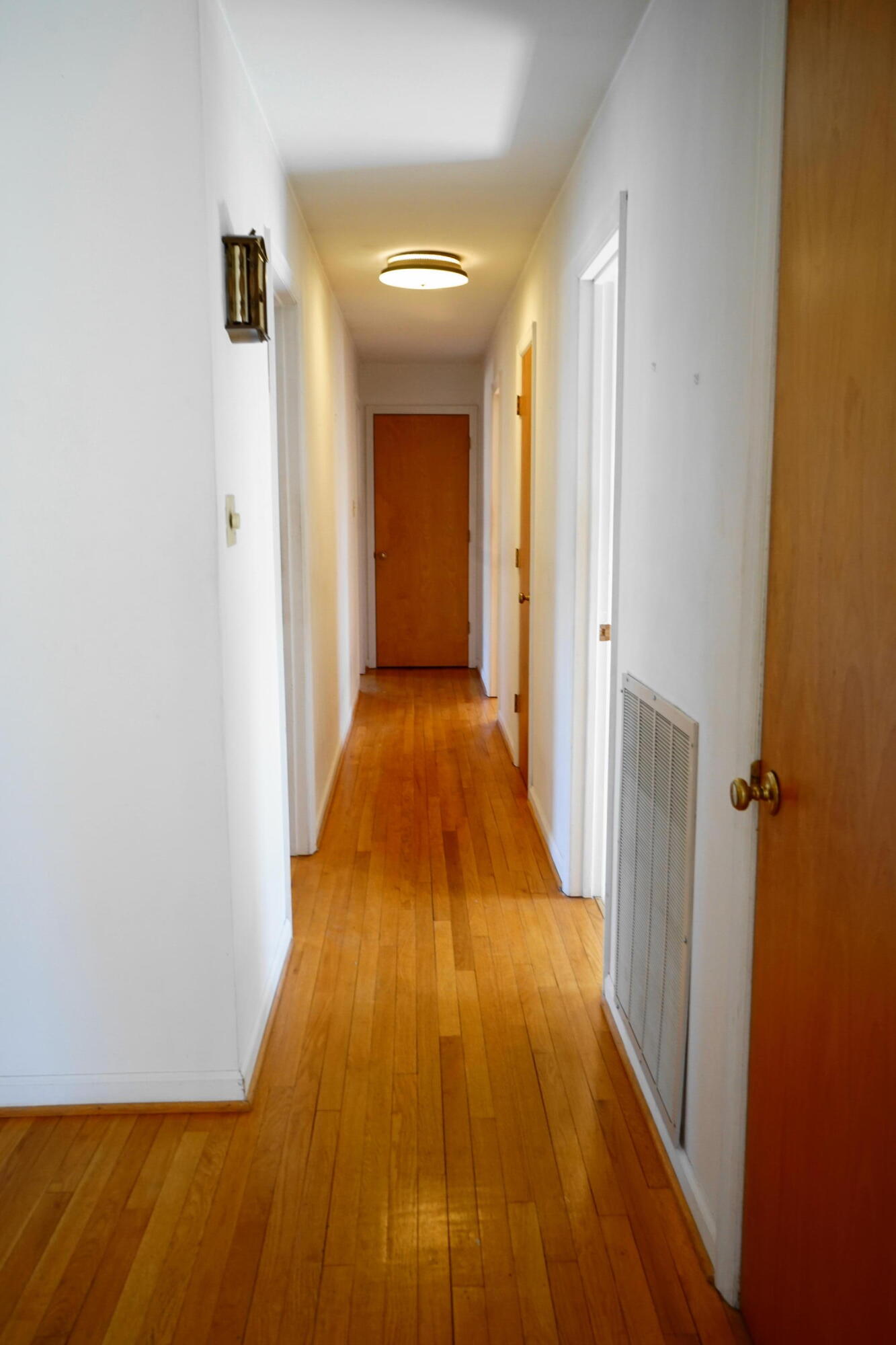 2231 Hardy Road Vinton, VA 24179 - Photo 20 of 38 a view of a hallway with wooden floor