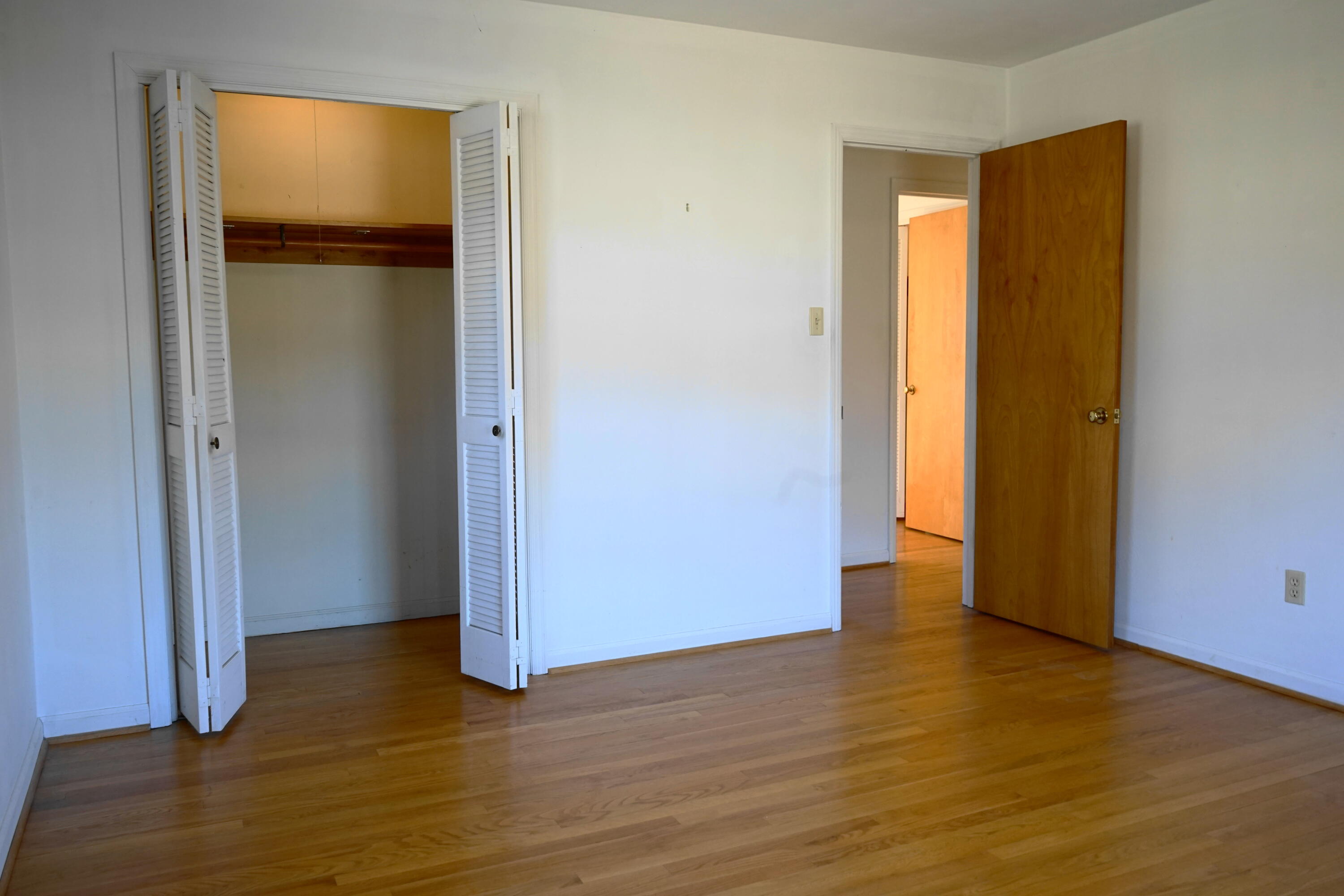 2231 Hardy Road Vinton, VA 24179 - Photo 25 of 38 a view of an empty room with wooden floor and closet