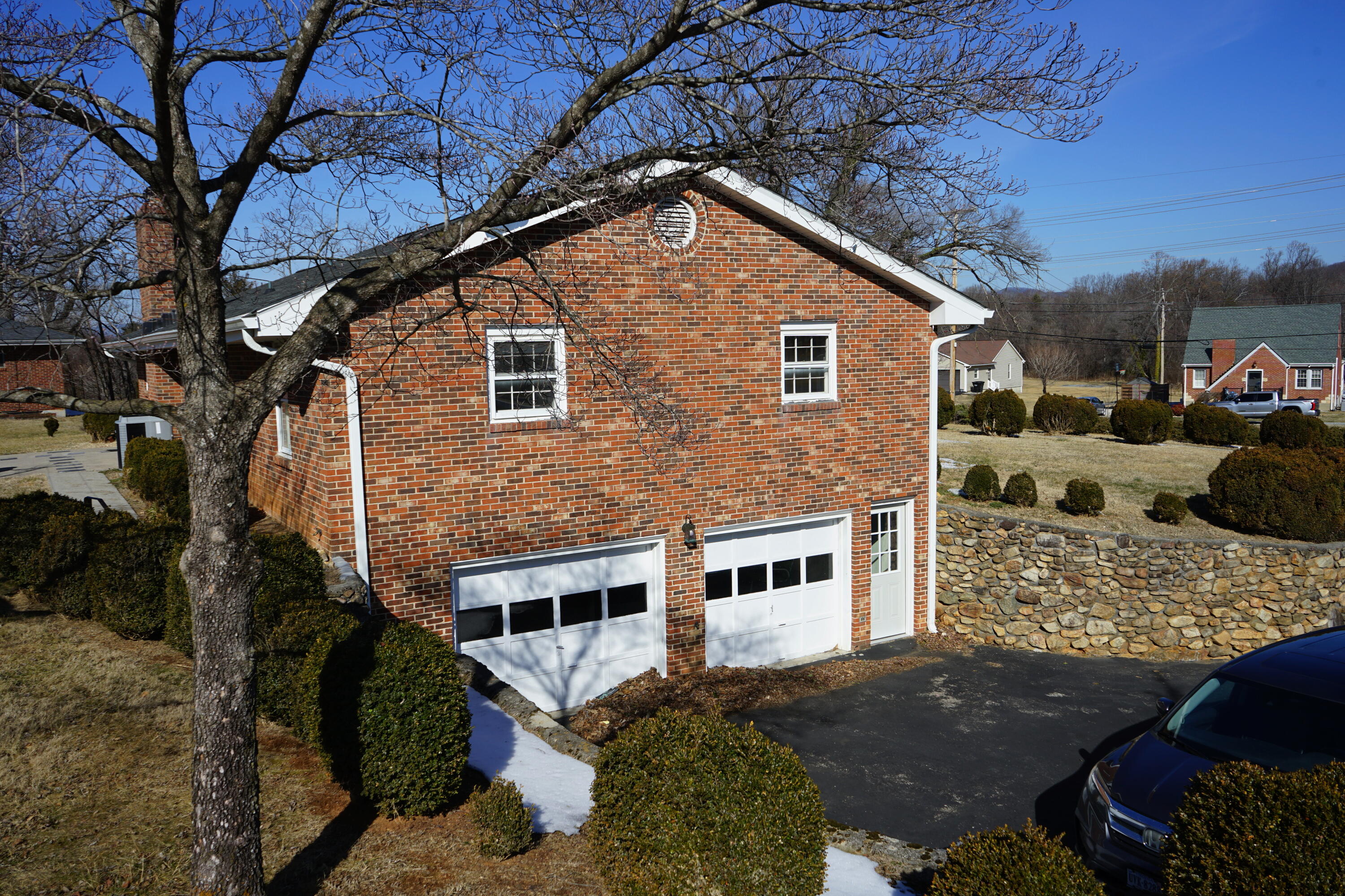 2231 Hardy Road Vinton, VA 24179 - Photo 3 of 38 a front view of a house with a yard
