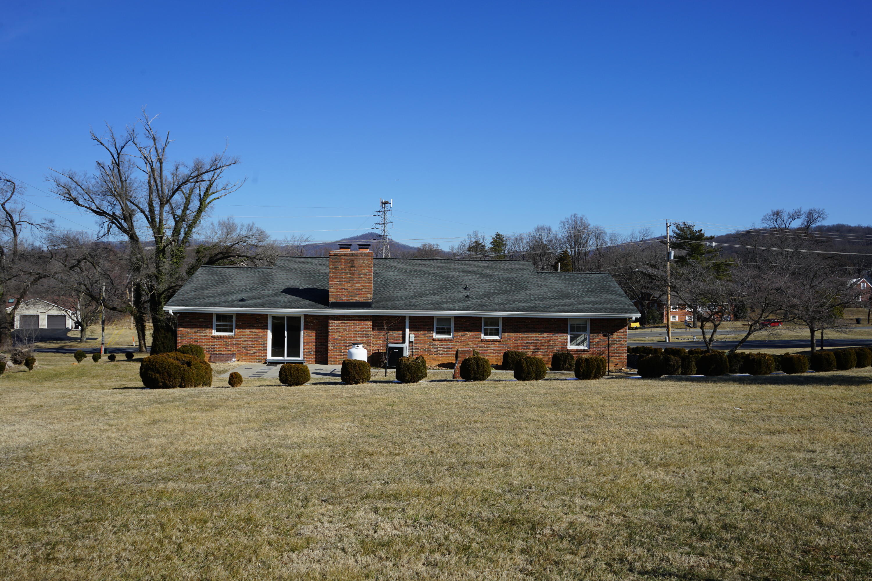2231 Hardy Road Vinton, VA 24179 - Photo 5 of 38 a front view of a house with a yard