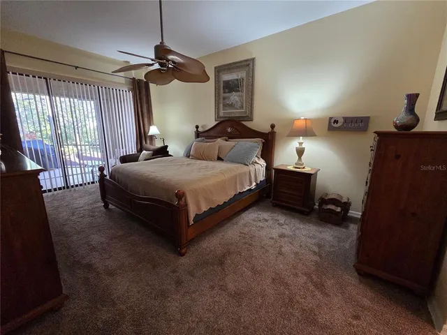 a bathroom with a tub shower and sink