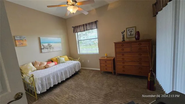 a view of a livingroom with furniture and front door