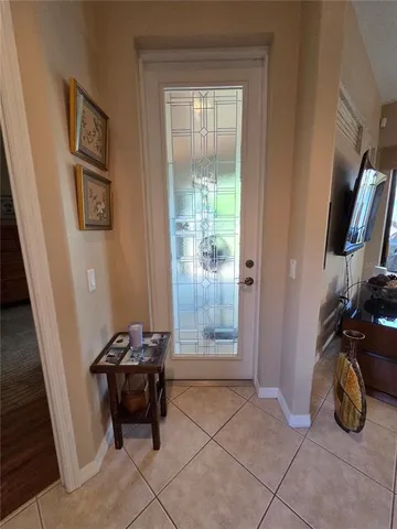 a dining room with furniture window and outside view