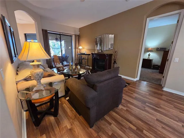 a kitchen with stainless steel appliances a refrigerator a sink a stove top oven a washer and dryer