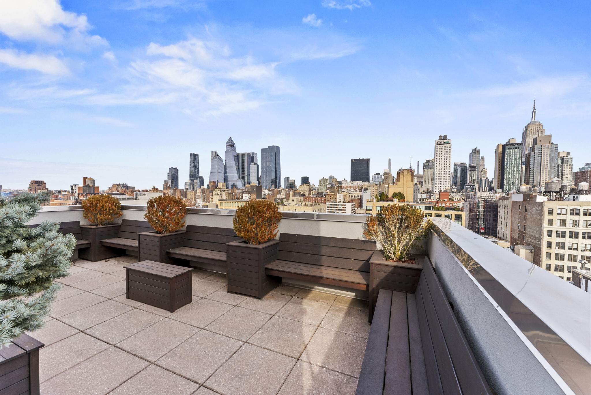 166 West 18th Street, Unit 2D Manhattan, NY 10011 - Photo 15 of 17 a view of a terrace with lawn chairs