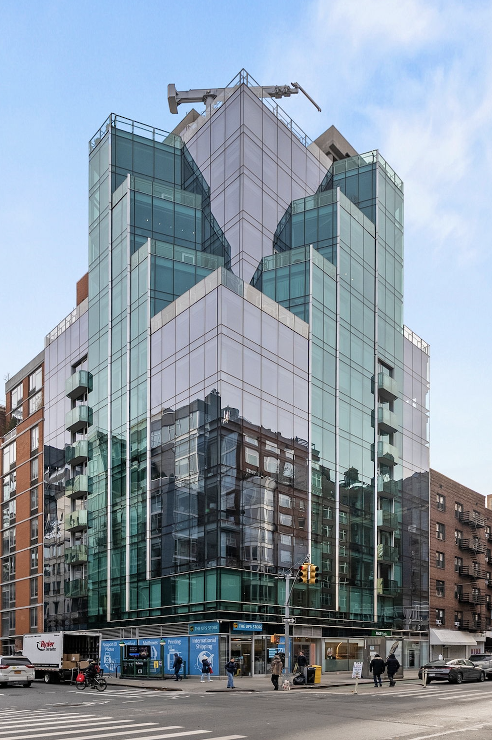 166 West 18th Street, Unit 2D Manhattan, NY 10011 - Photo 16 of 17 front view of a building with a street