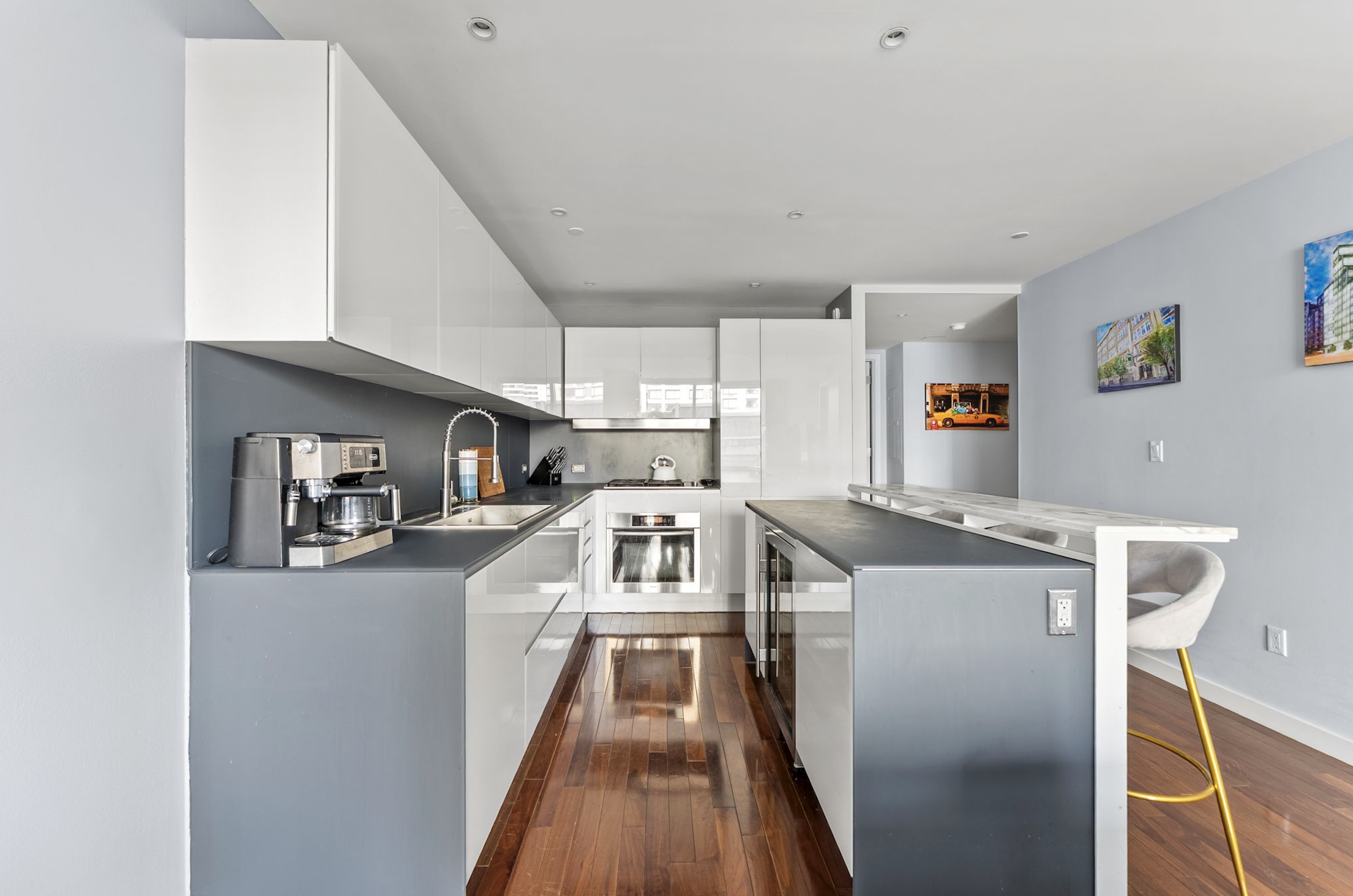 166 West 18th Street, Unit 2D Manhattan, NY 10011 - Photo 5 of 17 a view of a kitchen with a sink