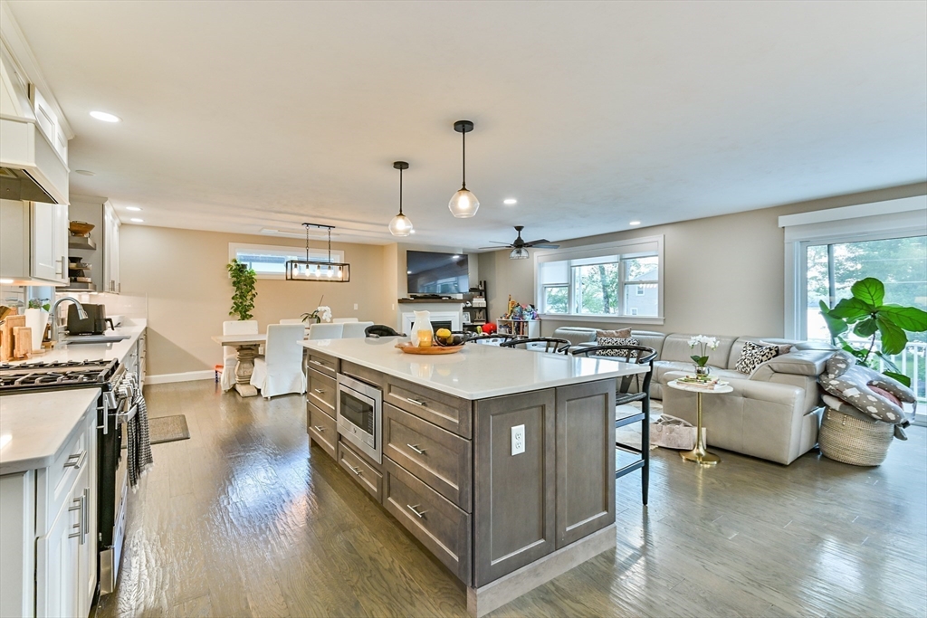 20 Lakeview Road Webster, MA 01570 - Photo 18 of 42 a kitchen that has a lot of cabinets a sink and a stove in it