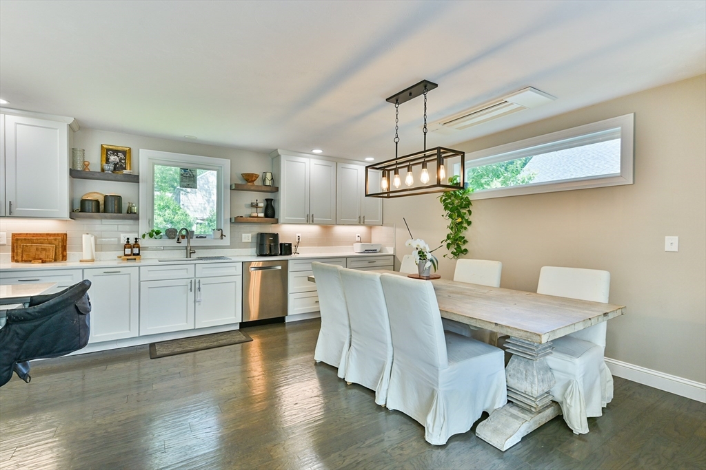 20 Lakeview Road Webster, MA 01570 - Photo 24 of 42 a kitchen with a table chairs sink and cabinets