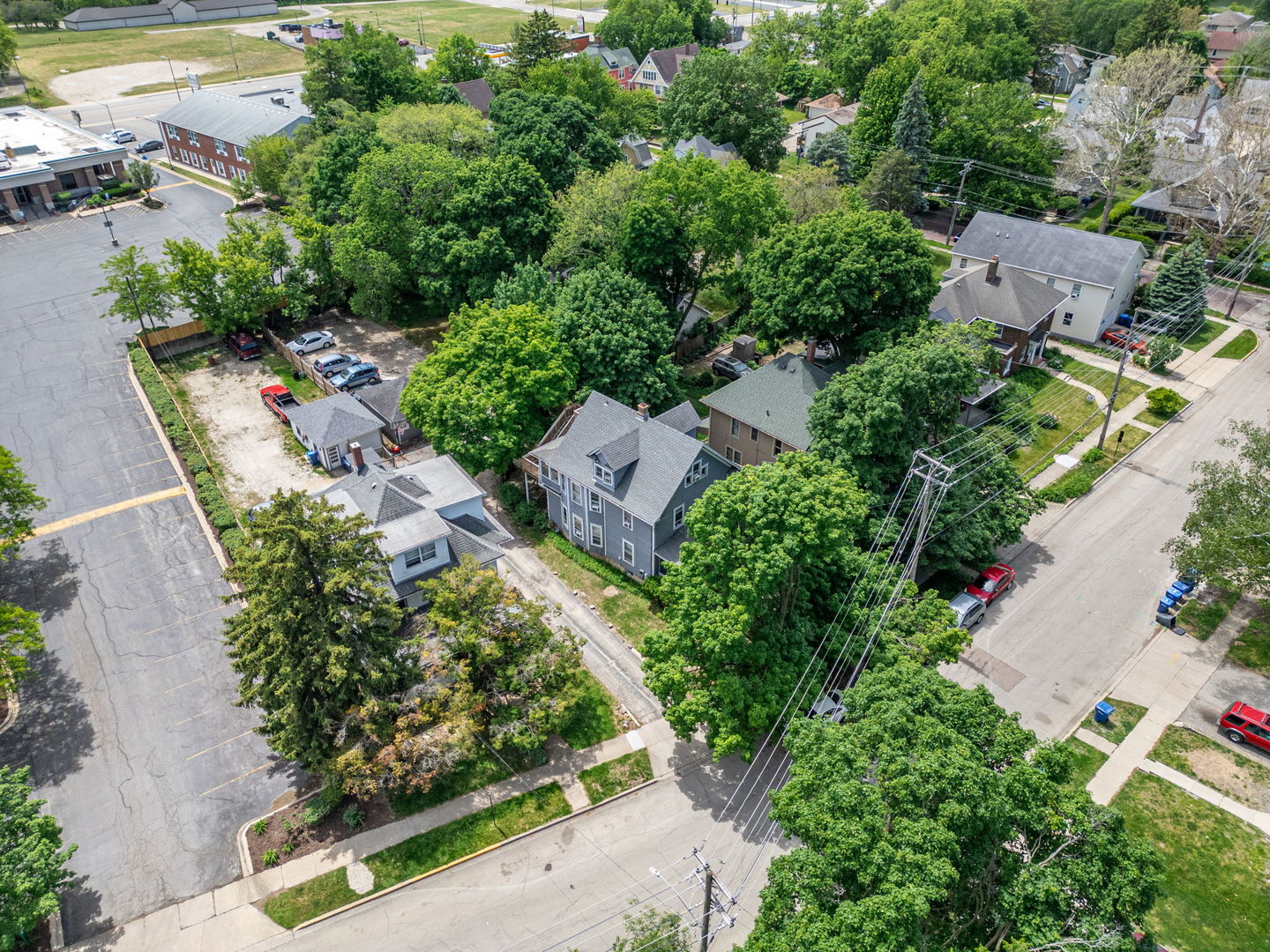 226 West Locust Street DeKalb, IL 60115 - Photo 34 of 40 an aerial view of residential house with outdoor space and trees all around