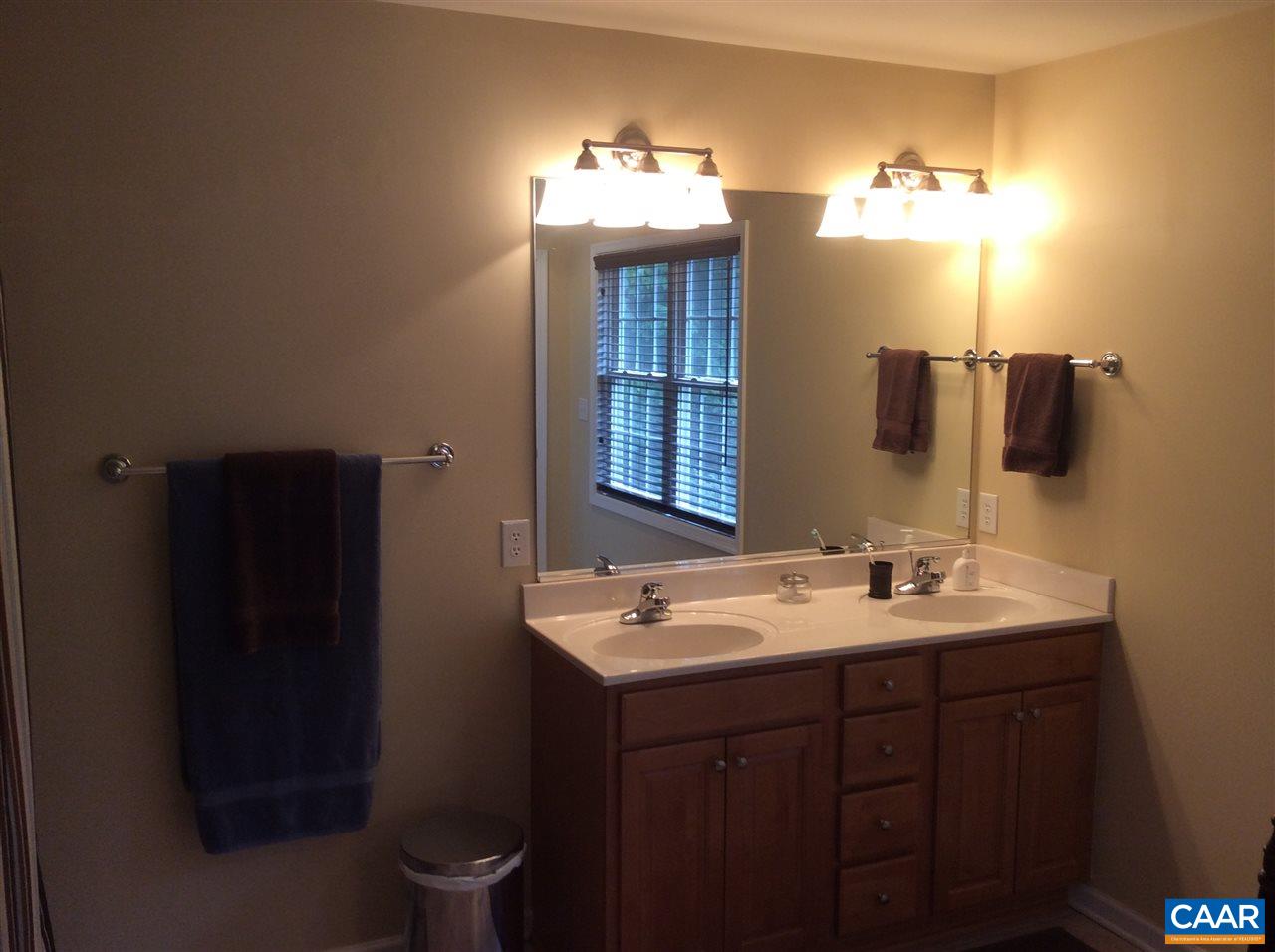 34 Xebec Road Palmyra, VA 22963 - Photo 14 of 28 a bathroom with a sink and a mirror
