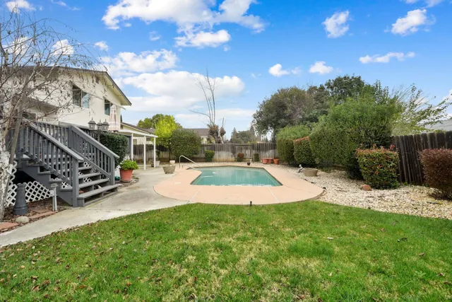 a house view with a outdoor space