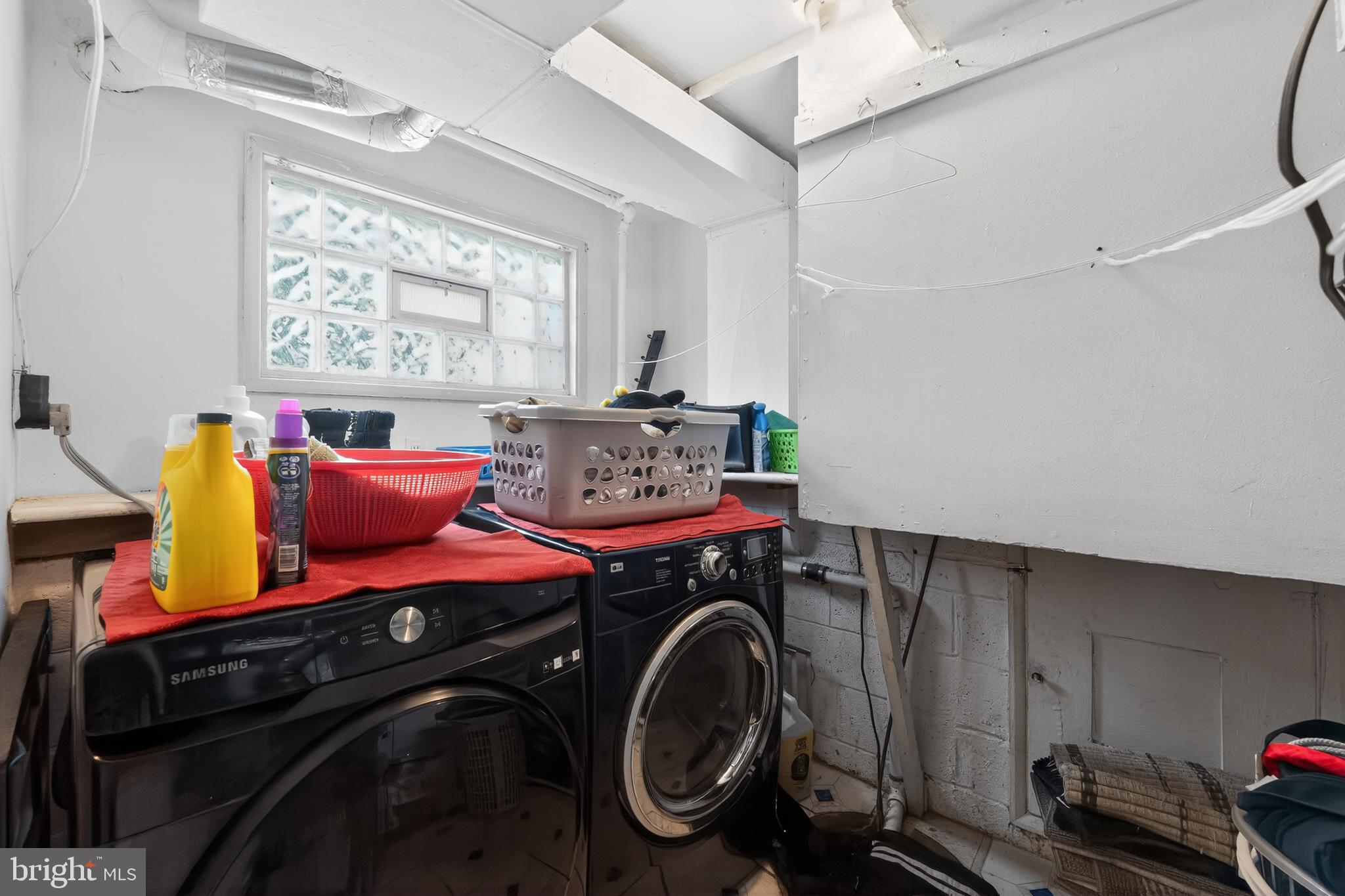 5909 Charnwood Road Catonsville, MD 21228 - Photo 27 of 31 Functional laundry space with natural light.