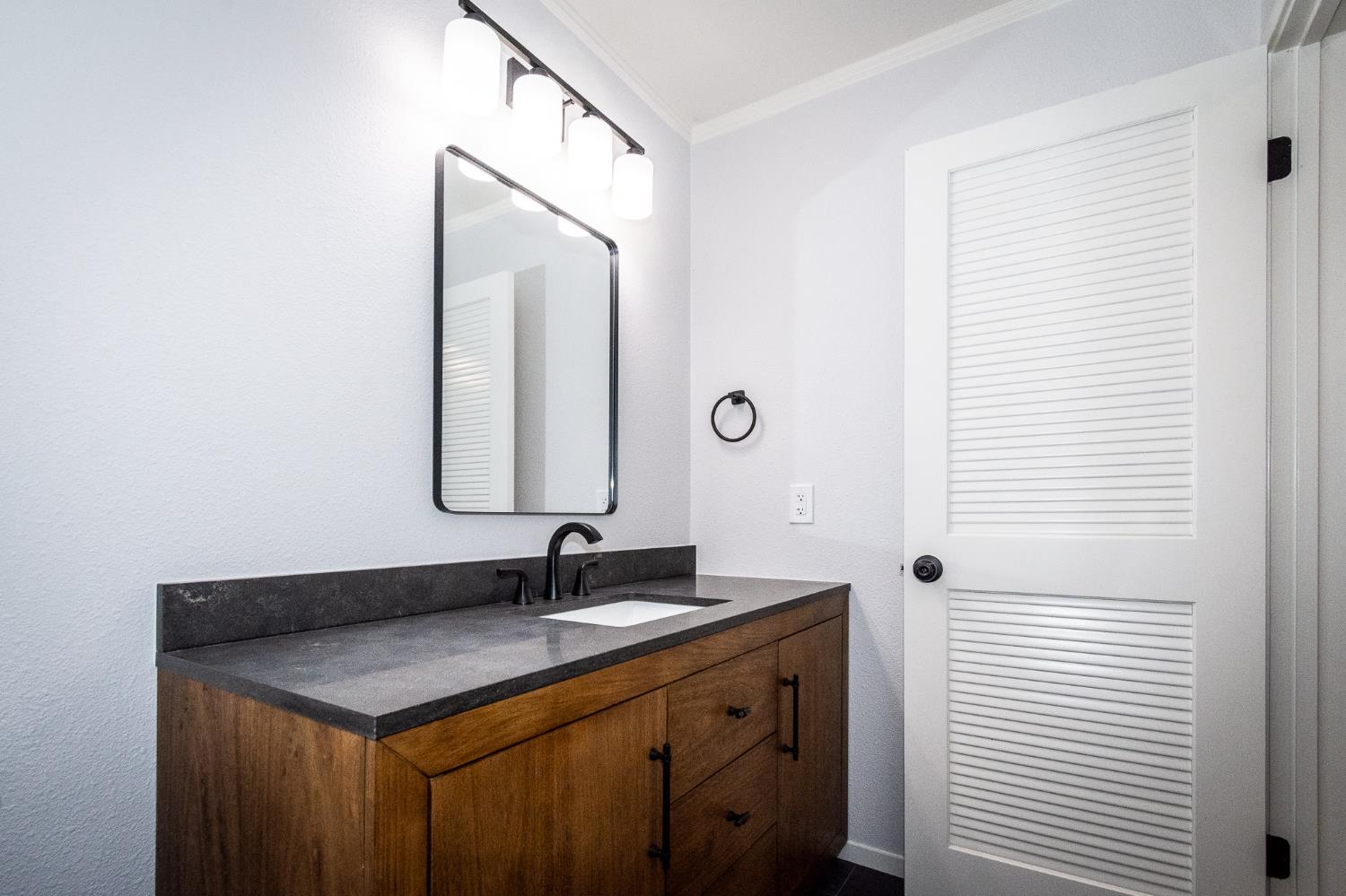427 Wyndgate Road Sacramento, CA 95864 - Photo 13 of 35 a bathroom with a sink and a mirror