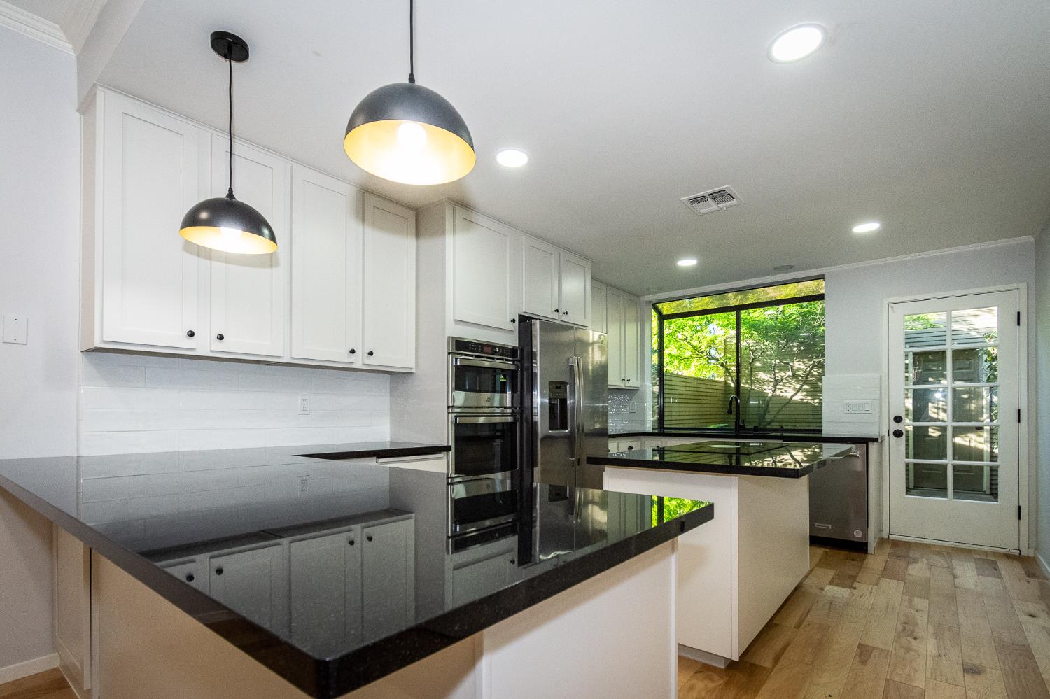 427 Wyndgate Road Sacramento, CA 95864 - Photo 3 of 35 a kitchen with stainless steel appliances granite countertop a sink a stove and a refrigerator