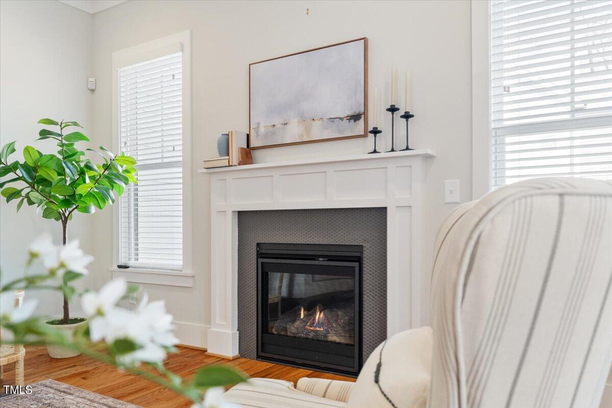 6152 Blanche Drive Raleigh, NC 27607 - Photo 20 of 47 a living room with furniture and a fireplace
