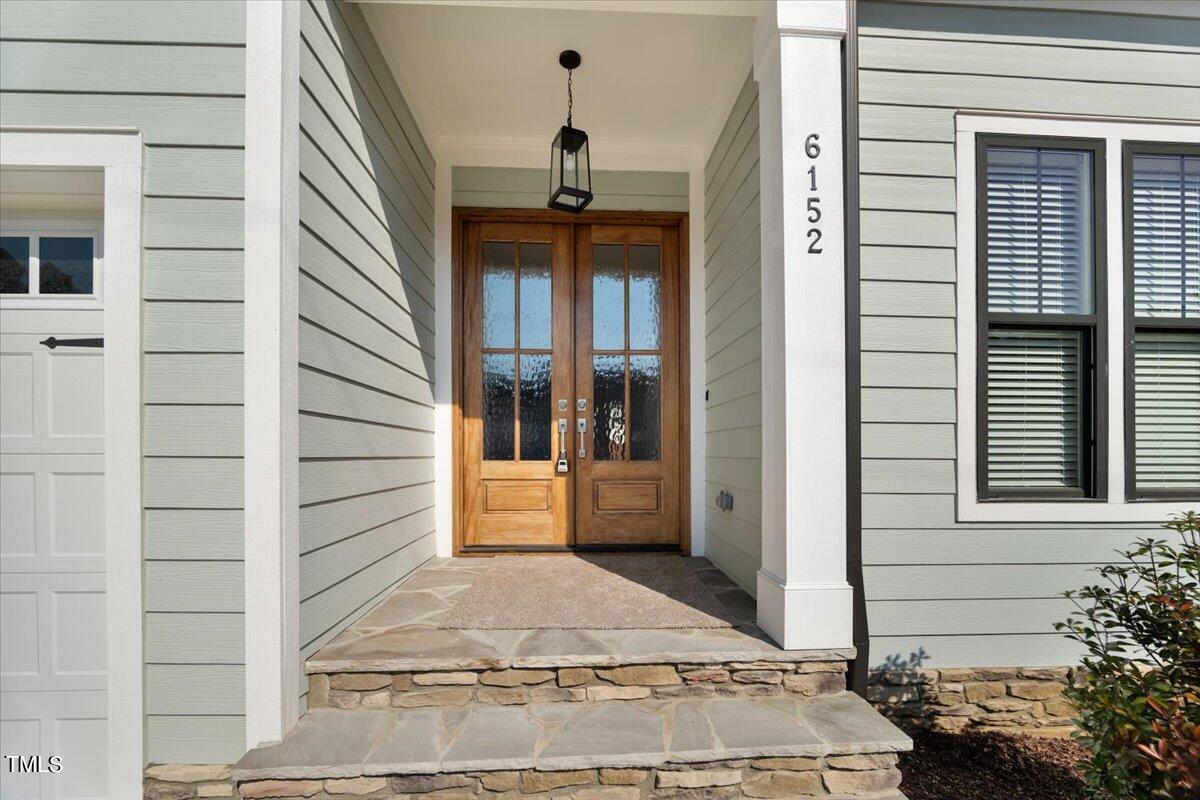 6152 Blanche Drive Raleigh, NC 27607 - Photo 2 of 47 a view of a entryway door front of house