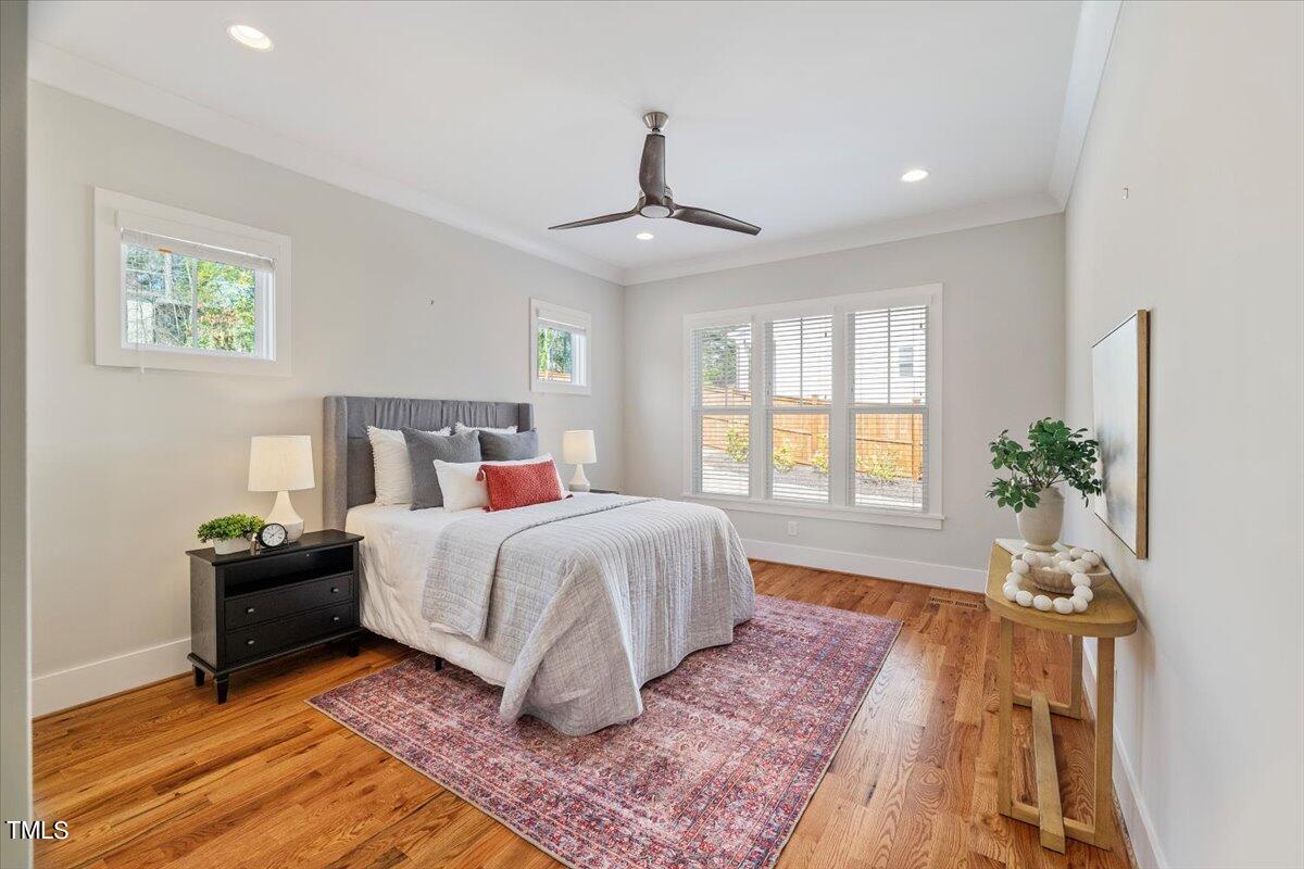 6152 Blanche Drive Raleigh, NC 27607 - Photo 21 of 47 a bedroom with bed and a window