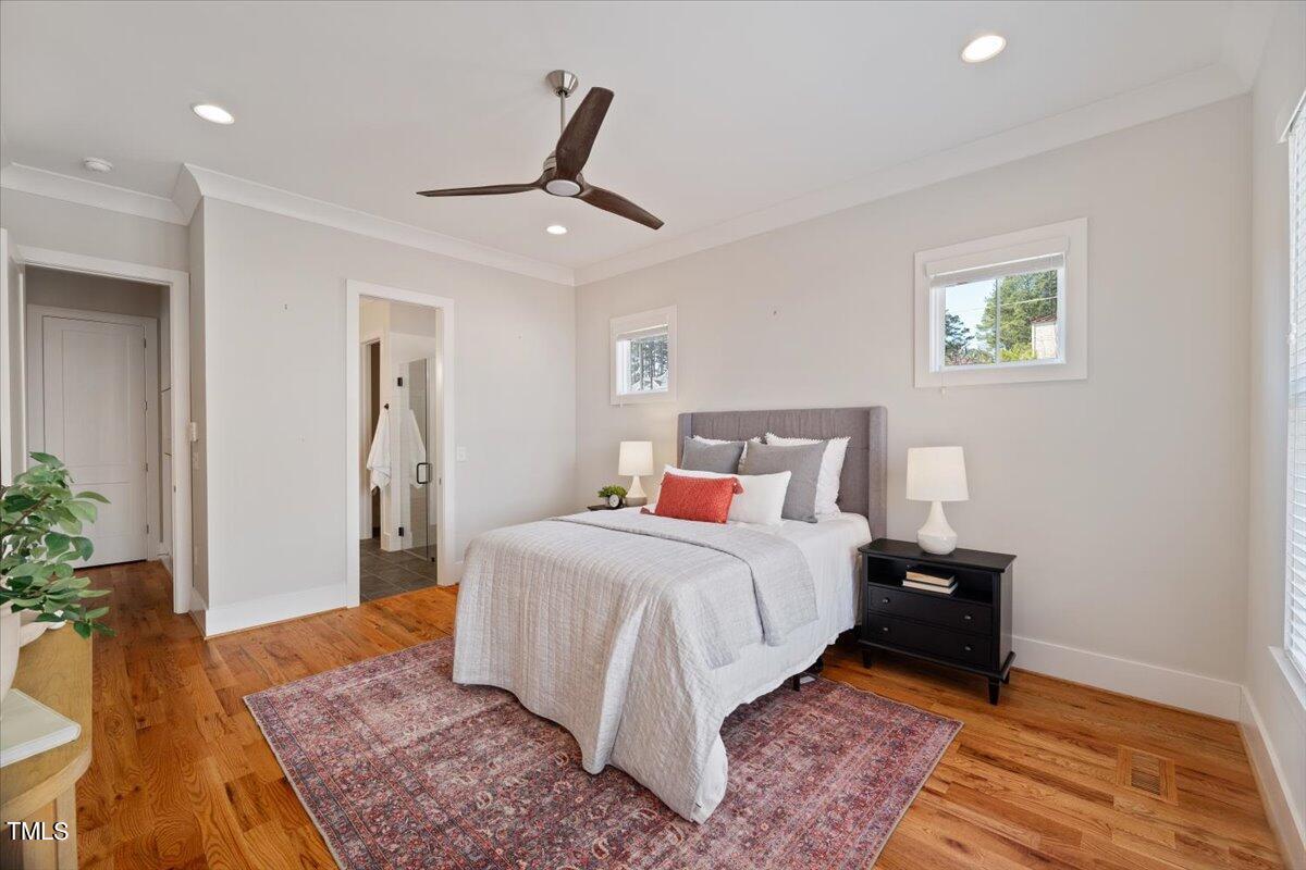 6152 Blanche Drive Raleigh, NC 27607 - Photo 22 of 47 a bed room with a bed and a couch