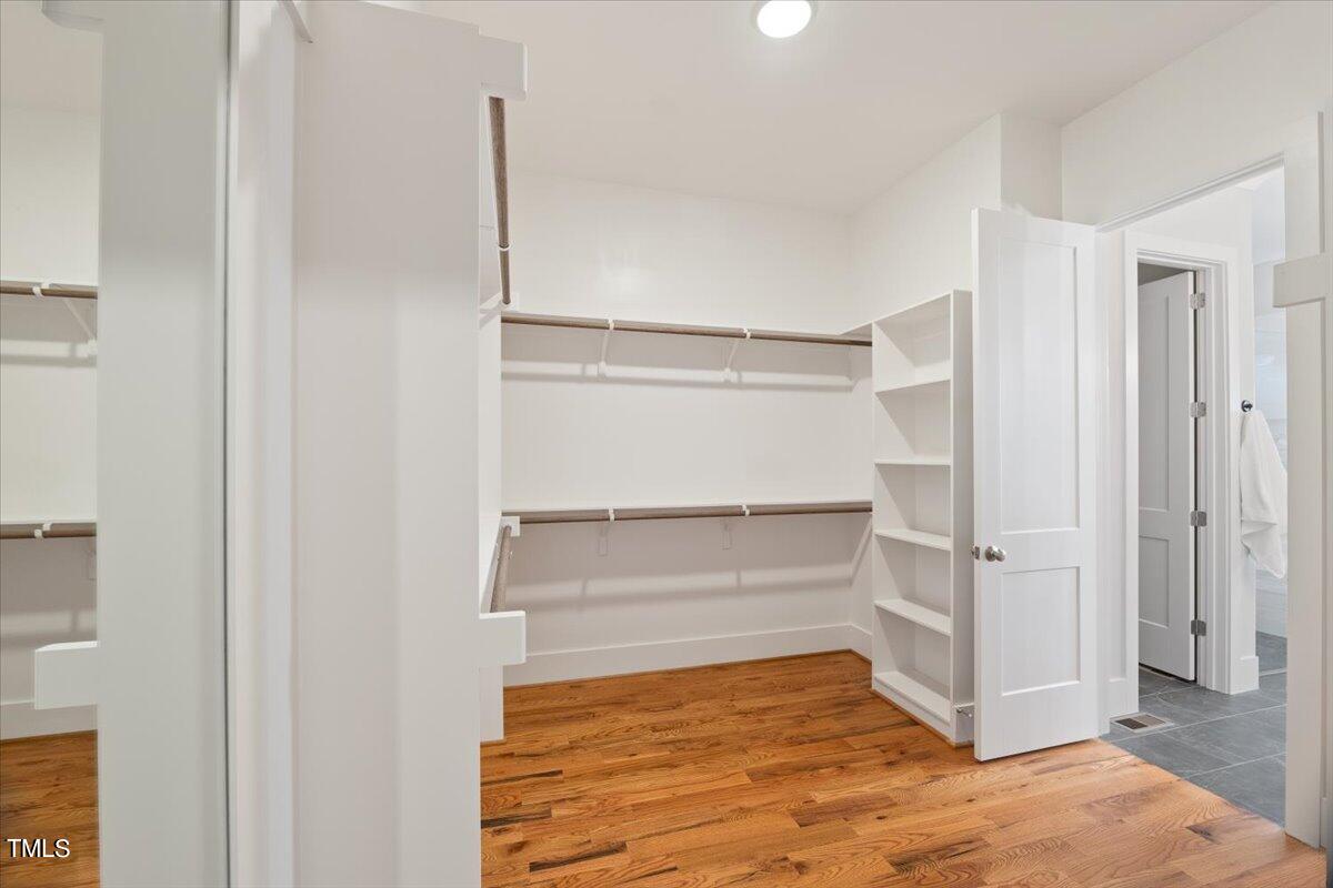 6152 Blanche Drive Raleigh, NC 27607 - Photo 26 of 47 a view of walk in closet with empty racks