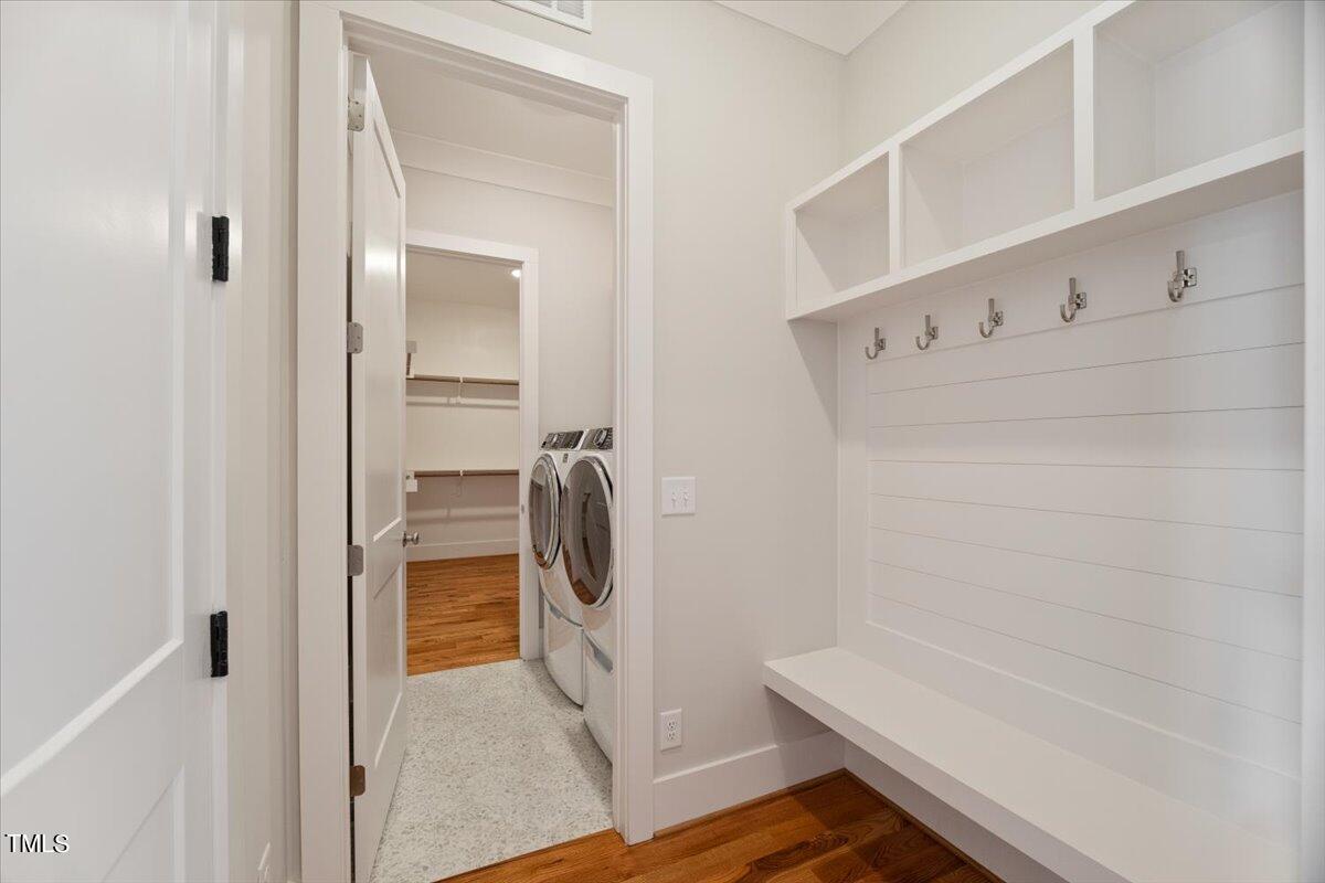 6152 Blanche Drive Raleigh, NC 27607 - Photo 28 of 47 a bathroom with a washer and dryer