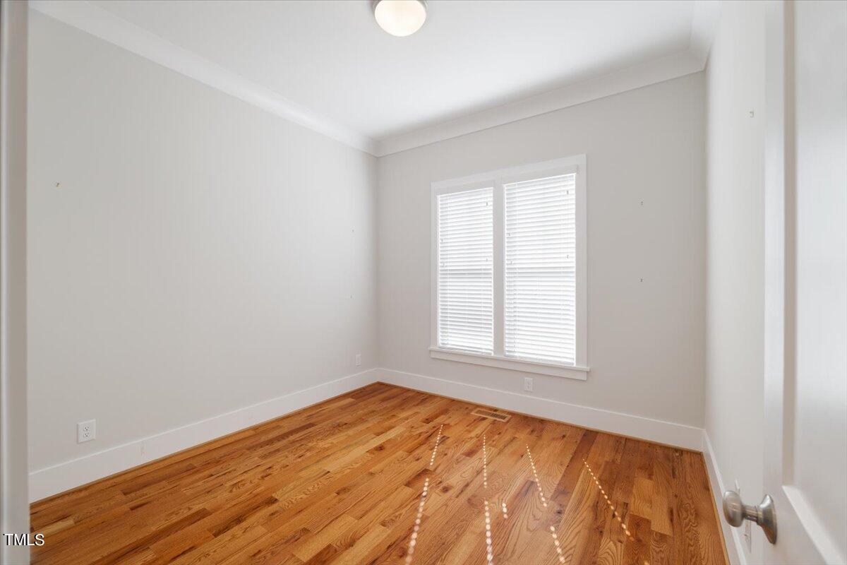 6152 Blanche Drive Raleigh, NC 27607 - Photo 29 of 47 an empty room with a window